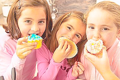 Girls enjoying their sweet treats here at Murphys Bakery in Bad Axe Michigan, where we have the best baked goods around. Everyone agrees -- our donuts are the BEST donuts, but our cupcakes are pretty great too